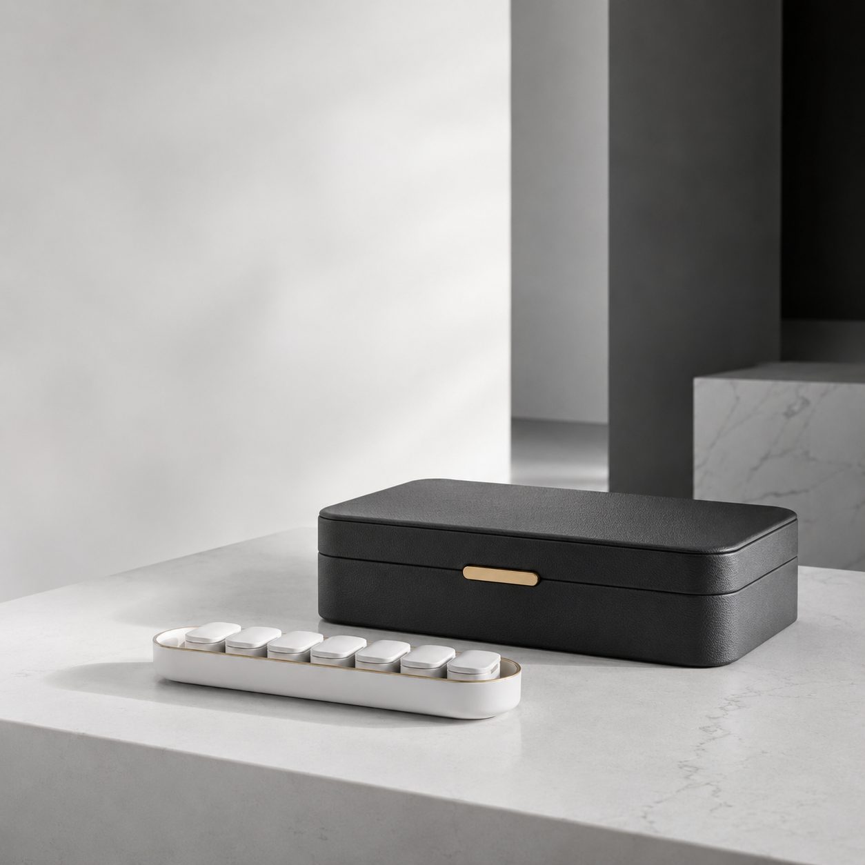 A Libra service case and a tray of daily pods on a console in an elegant home